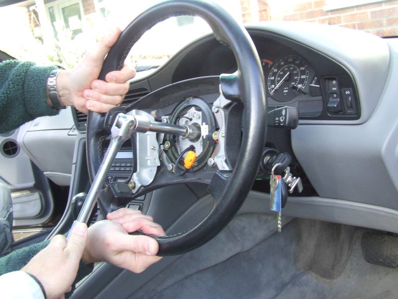 Remove steering wheel lock bmw